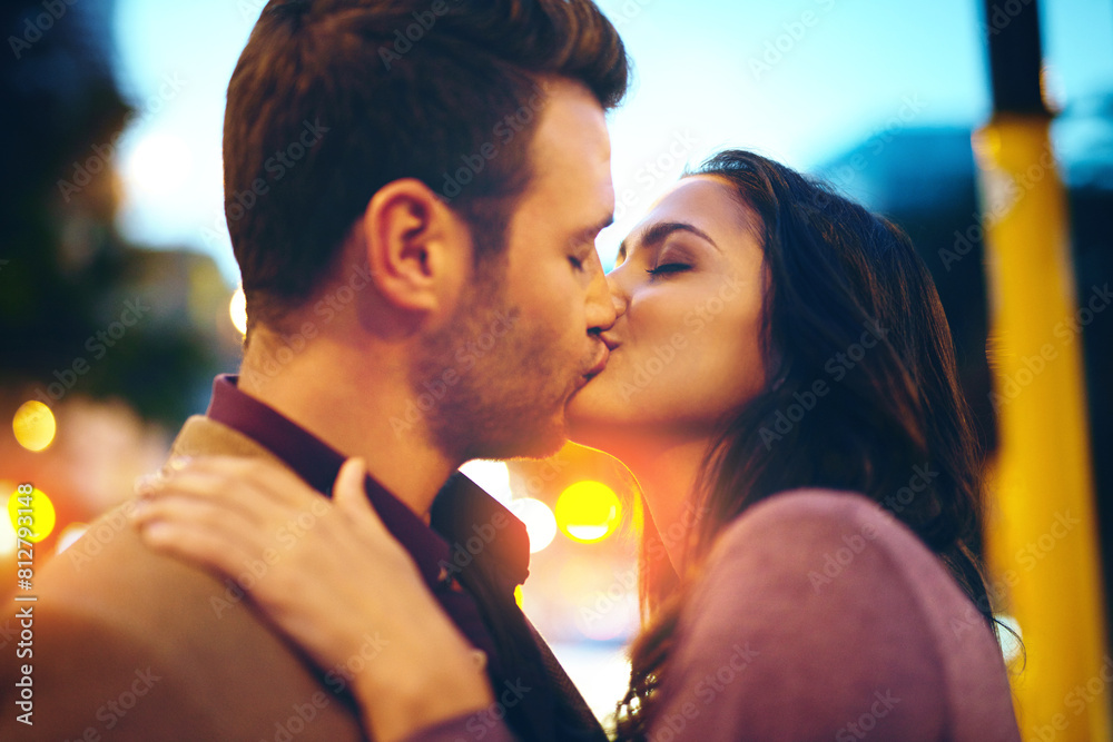 Night, kiss and couple on date, street and bokeh of light, city and anniversary of man with partner. New York, outdoor and woman with love for marriage, relationship and happiness, together and dark Night, kiss and couple on date, street and bokeh of light, city and anniversary of man with partner. New York, outdoor and woman with love for marriage, relationship and happiness, together and dark