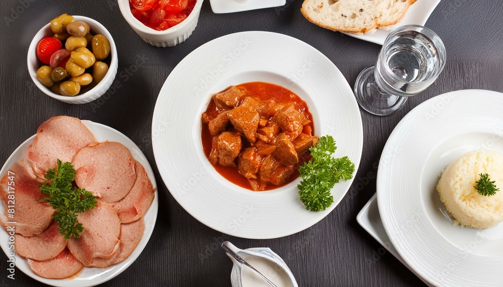 Juicy beef goulash with side dishes Juicy beef goulash with side dishes