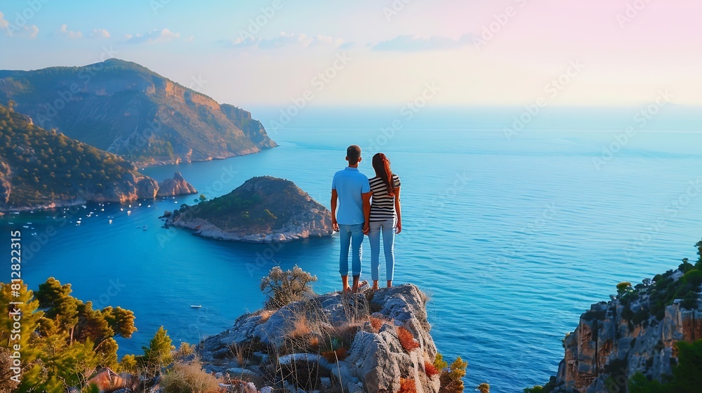 Fototapeta premium Lovers couple traveler stands together on hill rock over blue sea bay in Turkey butterfly valley Enjoy holiday vacation and beautiful traveling places : Generative AI