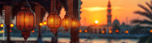 golden glow of ramadan lanterns illuminate the night sky over a serene body of water  with an orange lantern standing out in the foreground