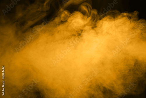 golden smoke steam spray, and abstract vapor water isolated on a black background. concept of texture cold mist or hot vapor, fog effect, and cloud for design air pollution, element smog, dust	
