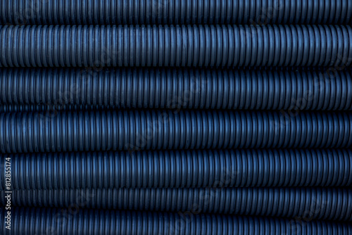 Abstract background of blue corrugated plastic pipes