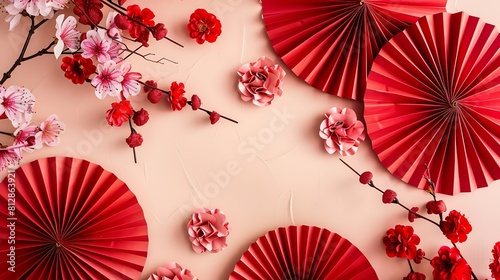 Chinese New Year dcor arrangement Top view of red paper fans and sakura bloom on a festive pastel beige table with empty space for wishes   Generative AI