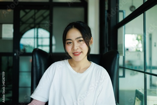 Happy Young Asian woman smiling and looking at camera positive young woman Asia