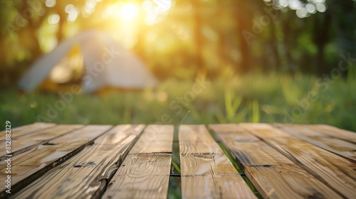 Wooden table top on blur tent camping travel tent and grass fieldFresh and Relax conceptFor montage product display or design key visual layoutView of copy space : Generative AI photo