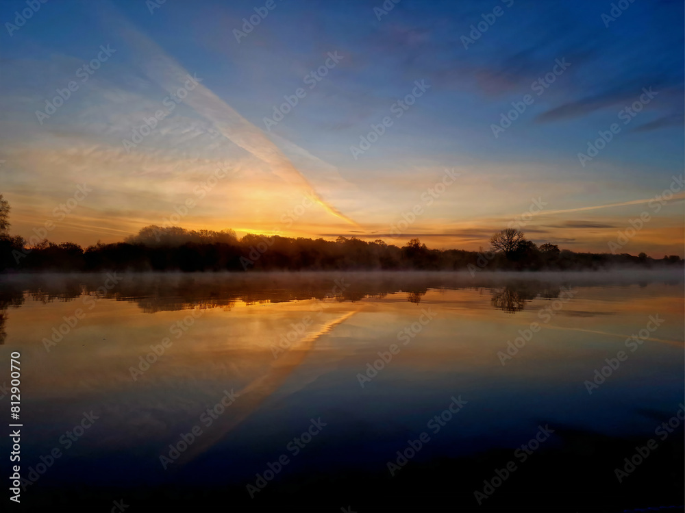 Fototapeta premium sunset over the river