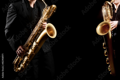 Saxophone player. Saxophonist jazz band playing baritone sax photo