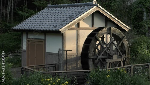 A Traditional Wooden Watermill with a Spinning Waterwheel  |  Inagi, Tokyo, Japan photo