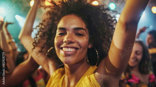 Smiling African girl with curly hair dancing on a summer music festival.