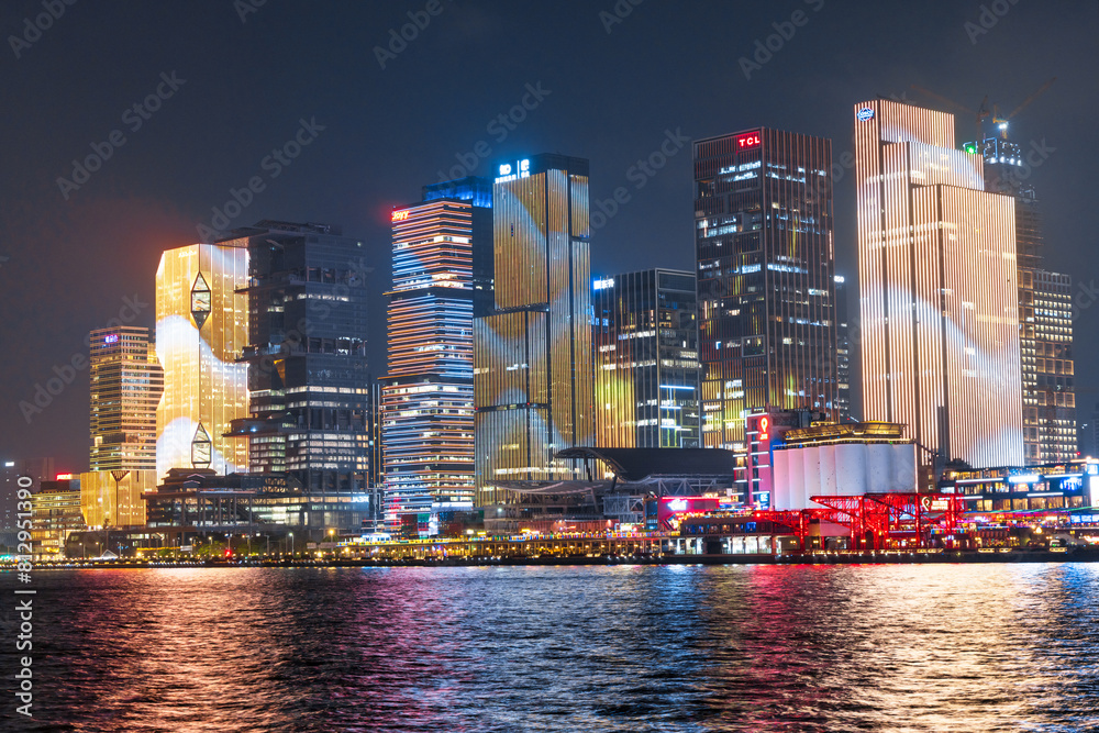 Naklejka premium Guangzhou, 13 April 2024: Canton skyline cityscape with skyscrapers in downtown at night in Guangzhou, China