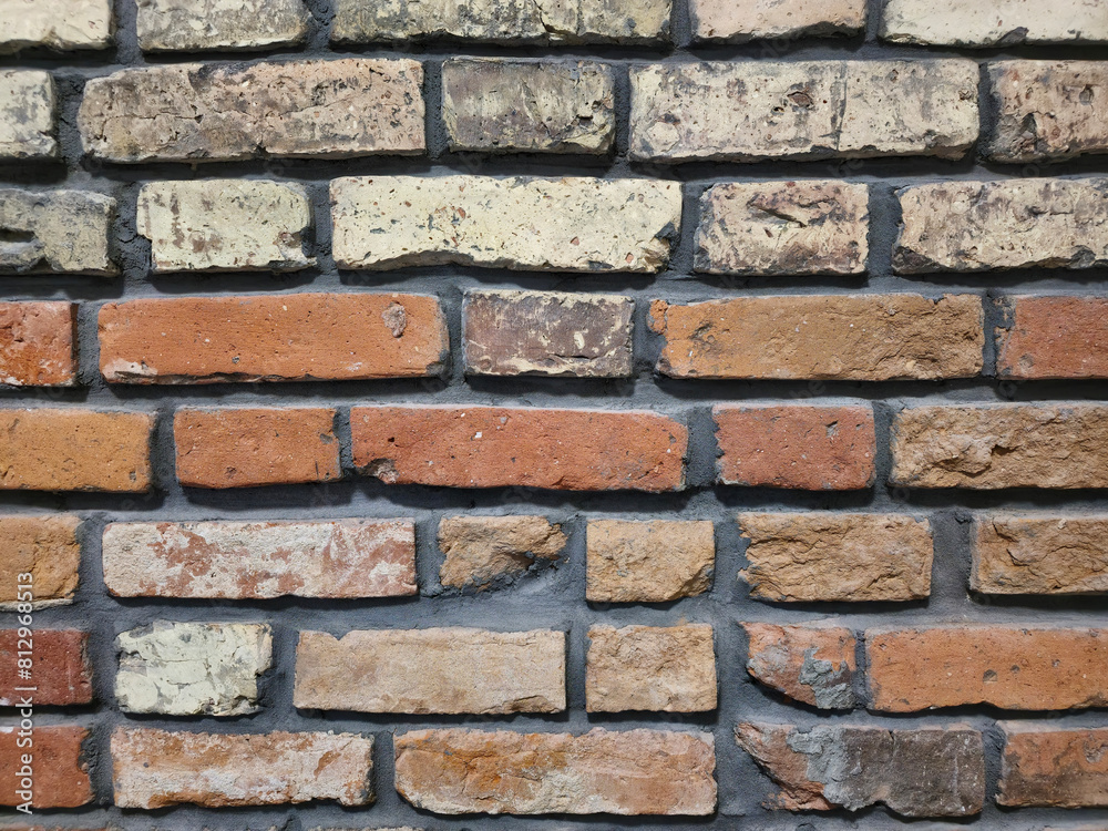 Obraz premium Ceglana , murowana ściana budynku loftowego, industrialna architektura
