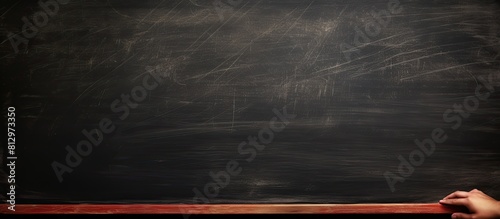 The image shows chalk marks being erased on a blackboard with available space for copying