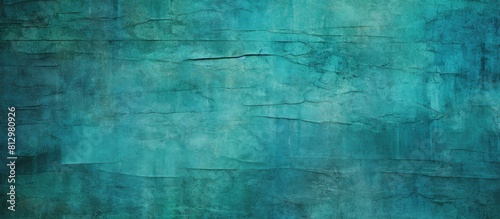 Teal colored panorama wall background with varied textures in shades of teal or petrol providing ample copy space image