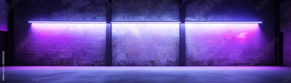 The photo shows a dark stage with purple lights.