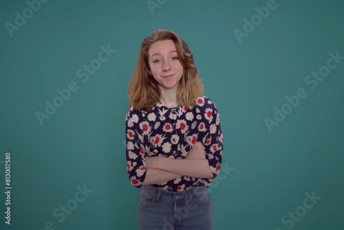Confident Teen Girl in Floral Sweater, Teal Background. Generative AI. © Tuyres