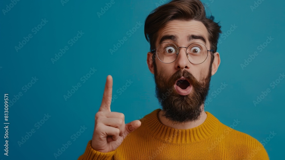 Young handsome man with beard wearing casual t-shirt standing over white background looking away to side with smile on face, natural expression. Laughing confident. Young handsome man with beard wearing casual t-shirt standing over white background looking away to side with smile on face, natural expression. Laughing confident.