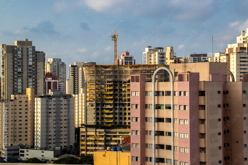 Fototapeta premium The exterior of modern condominiums is used full of glass, including sliding doors, windows and balconies. to avoid feeling cramped in Brazil