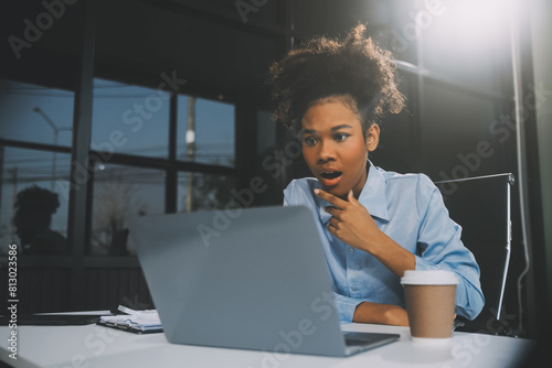 Tablou pe pânză business woman sitting at work stressed , out working hard Feeling stressed out