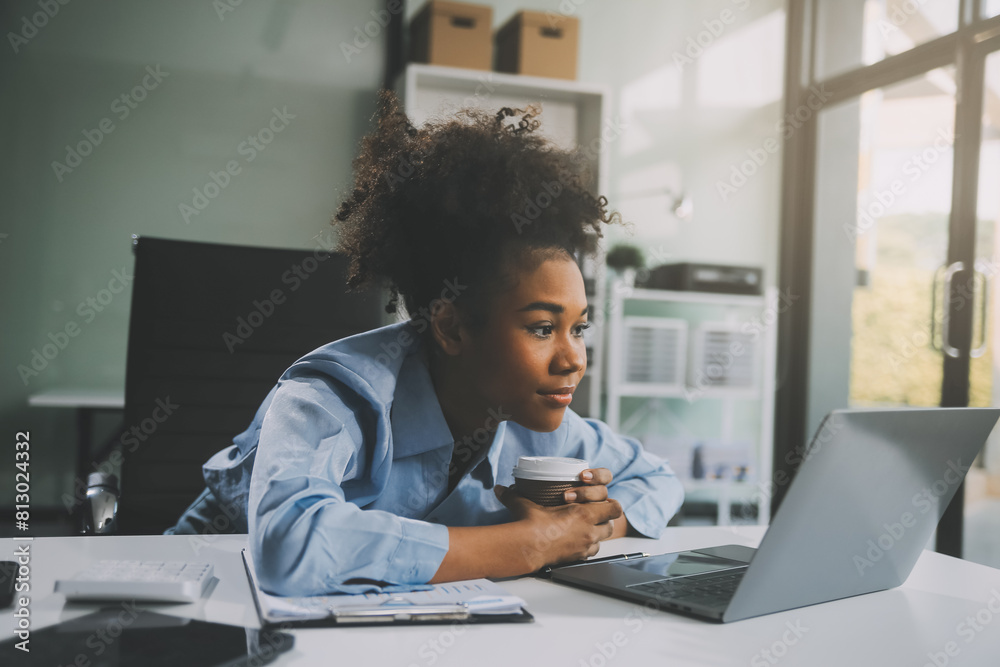Sad tired young asian lady thinking, sleep at laptop, suffering from overwork, stress in room interior. Deadline, problems in study, work, business, freelance at home new normal with tech