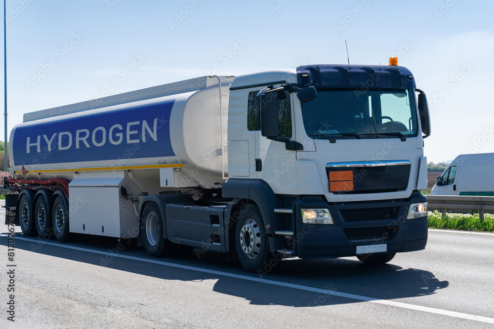 Fototapeta premium Truck with hydrogen tank trailer. Hydrogen transportation concept