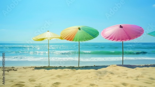 Colorful Chinese paper parasols for shade at the sunny beach. summer day