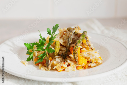 Orzo pasta, orzotto with pumpkin and asparagus