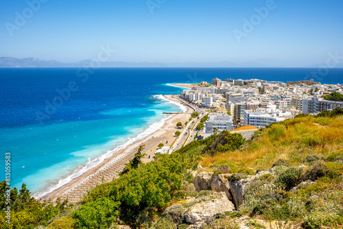 Fototapeta Naklejka Na Ścianę i Meble -  Aegean beach with sunshades in city of Rhodes (Rhodes, Greece)