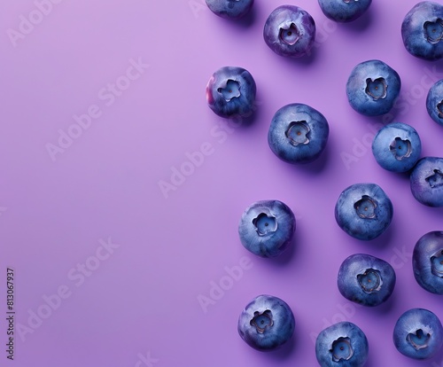 blueberries on a purple background, space for text on left side photo