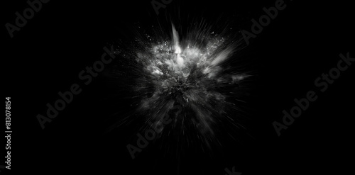 Explosion on a black background. White explosion from the center of the composition. Abstract explosion of white dust on a black background