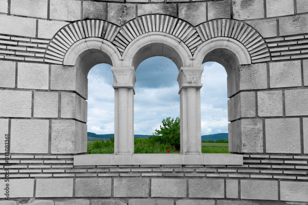 Landscape nature trough window of basilica, Pliska, Bulgaria Landscape nature trough window of basilica, Pliska, Bulgaria