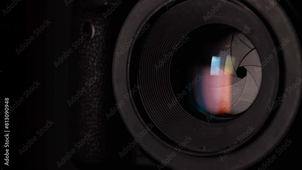 Close-up optical close-up black DSLR camera with closed iris diaphragm blades cine lens