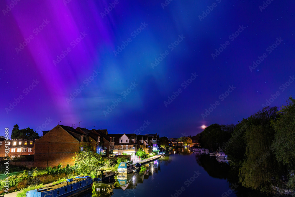 Fototapeta premium the unusual astronomy event, Aurora Northern Light in Downtown center of Caversham of Reading, Berkshire, England, summer 2024