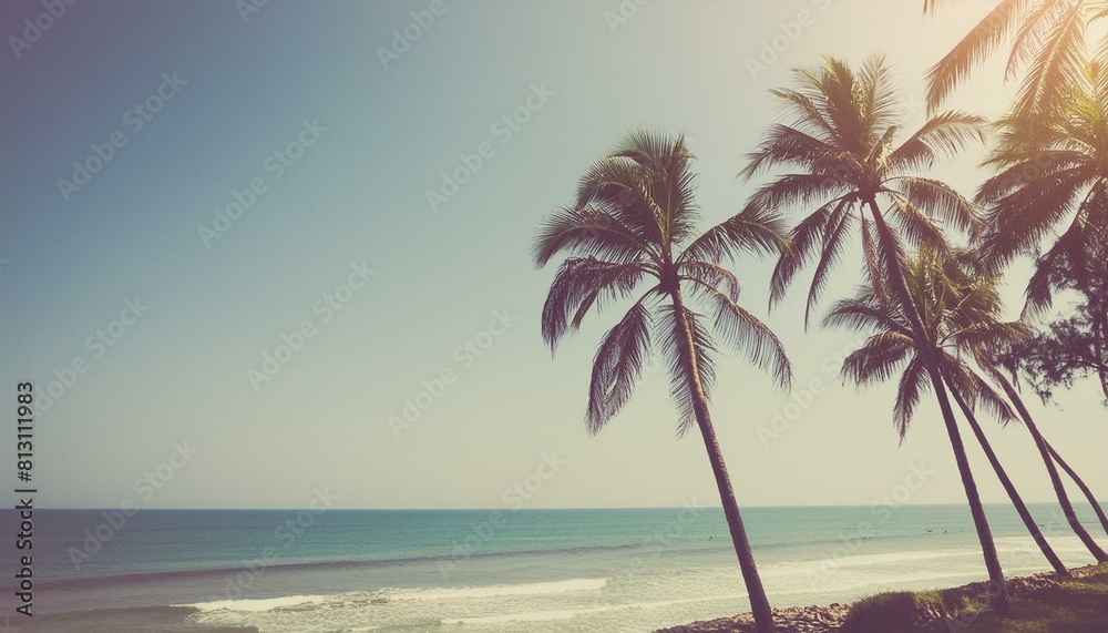 intage-filtered coconut trees on a tropical coastline under a clear blue sky, with a retro
