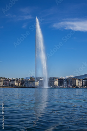 Beautiful view of the water Jet Fountain (Jet d'Eau fountain, 140 meters) in the lake of Geneva (Lac Leman). GENEVA, SWITZERLAND.