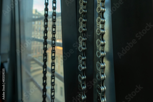 bicycle chain hanging on a hook and drying after cleaning