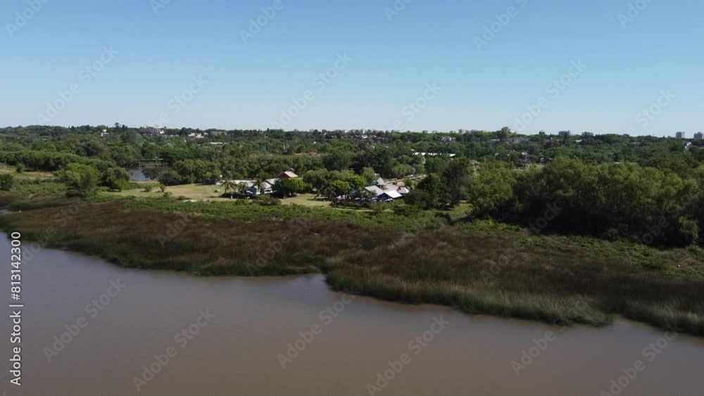 Aerial view of two houses at the edge of the Rio de La Plata in the city of Buenos Aires, Argentina.
Aerial view of two houses at the edge of the Rio de La Plata in the city of Buenos Aires, Argentina.