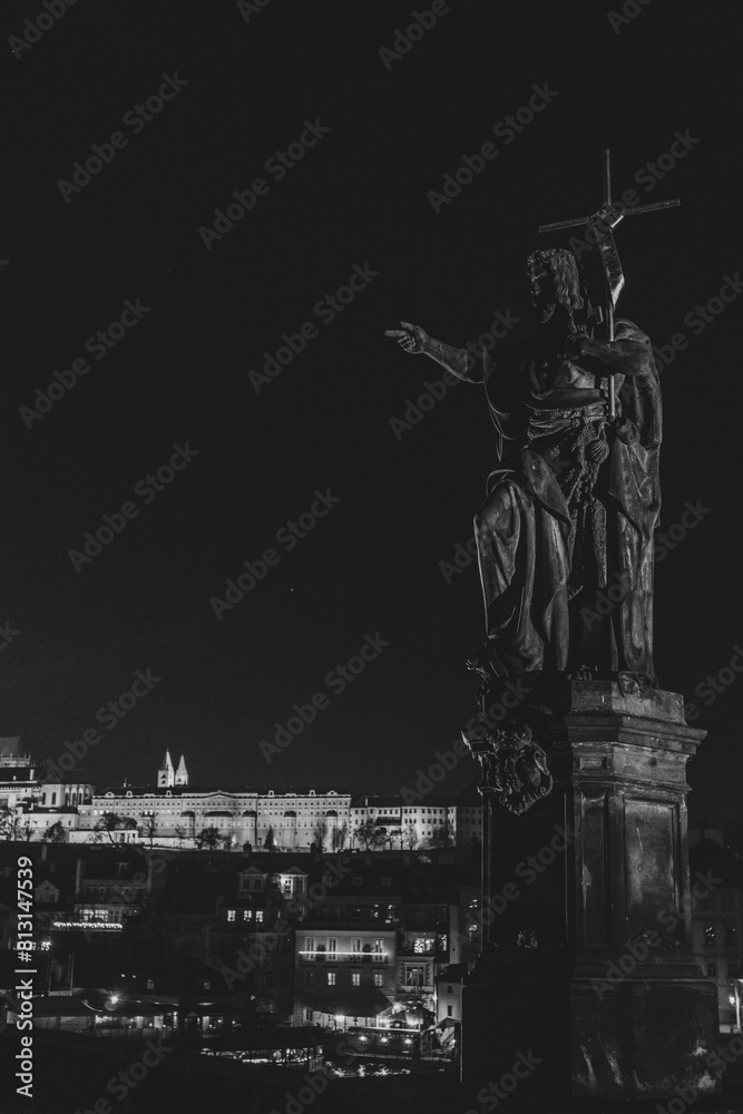 Fototapeta premium Amazing, scenic view to Lesser Town (Mala Strana), Prague Castle and Charles Bridge from the other side of Vltava river, illuminated by the city lights. Czech Republic