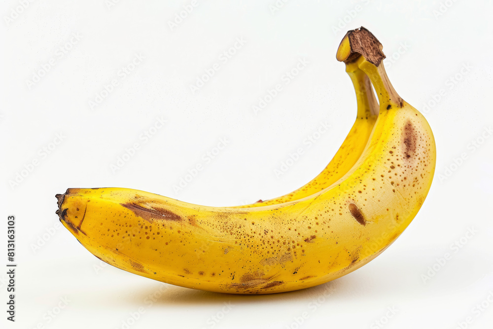 A ripe yellow banana isolated against a clean white backdrop, cut out from the background, with no background. Concept of nutrition and health. Generative Ai. A ripe yellow banana isolated against a clean white backdrop, cut out from the background, with no background. Concept of nutrition and health. Generative Ai.