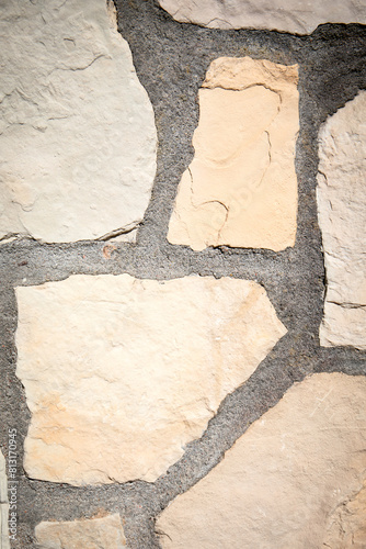 Decorative masonry wall. Light stone texture background