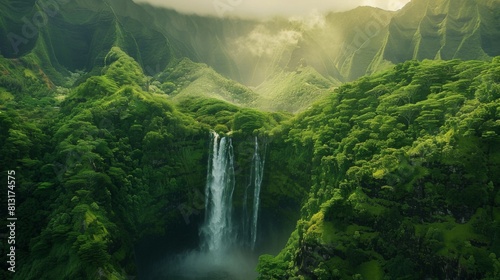 A majestic waterfall cascading down lush green mountains, embodying the raw power and beauty of nature.