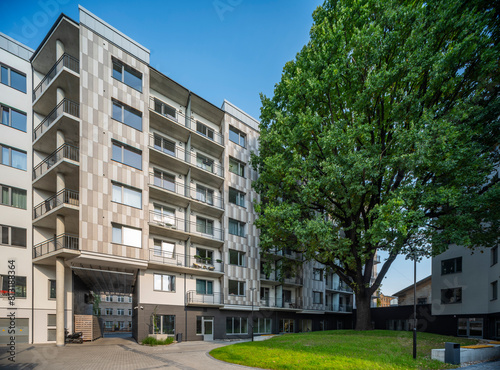 Courtyard and fasade of a modern residential house in a European city.