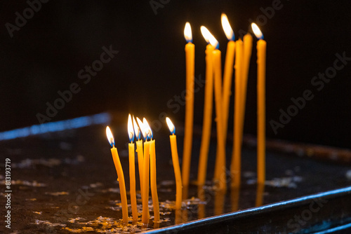Obraz na plátně Armenia. Yerevan. Candles placed by parishioners in the church.