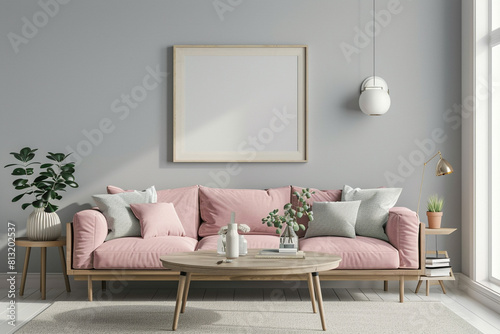 Scandinavian style interior with a soft pink sofa and a light oak coffee table under a framed mockup on a neutral gray wall.