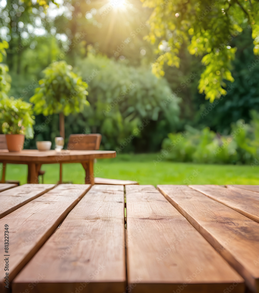Wooden table top on blur background of green garden with bokeh sunlight. High quality photo Wooden table top on blur background of green garden with bokeh sunlight. High quality photo