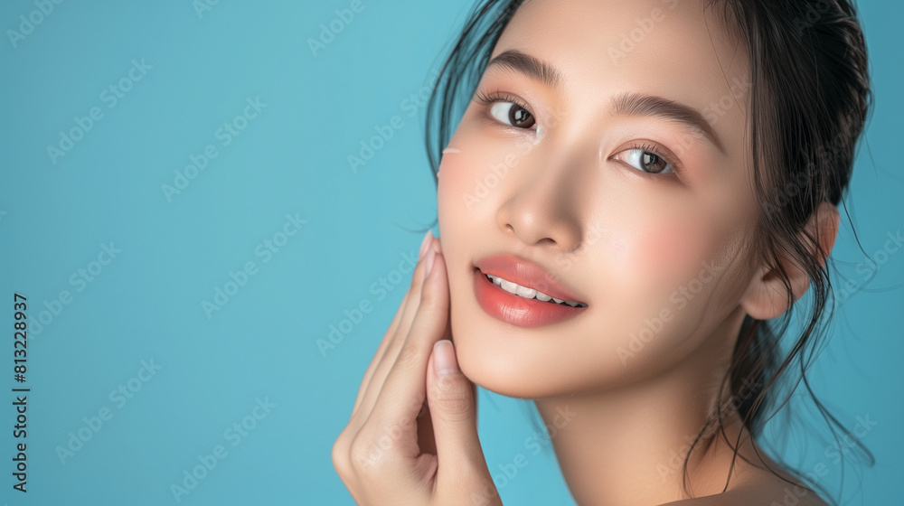 Young Asian Woman Posing With Hand on Face