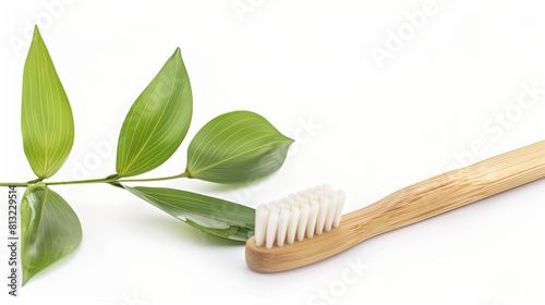 Bamboo Toothbrush Next to Green Leaf