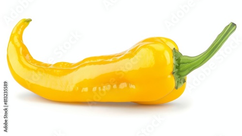 vibrant yellow chili pepper with green stem isolated on a white background food photography