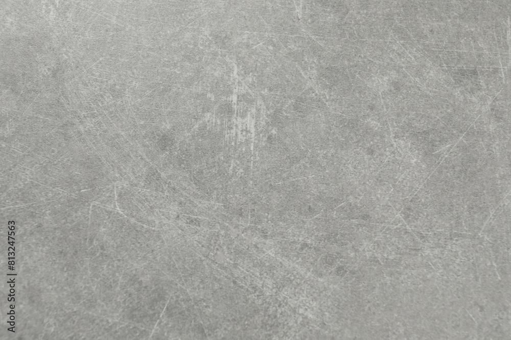 Naklejka premium Grey concrete textured surface as background, closeup
