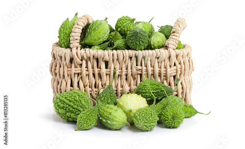 bitter gourd or bitter melon,momordica charantia in basket isolated on withe background with clipping path.