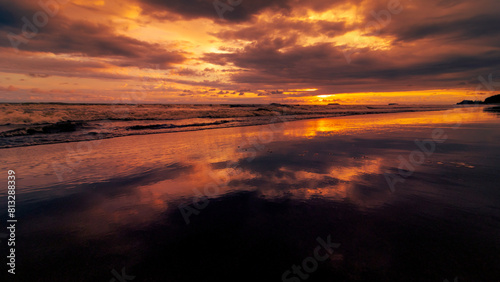reflection of clouds at beach © Johnster Designs